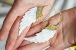 Earrings big wings shel